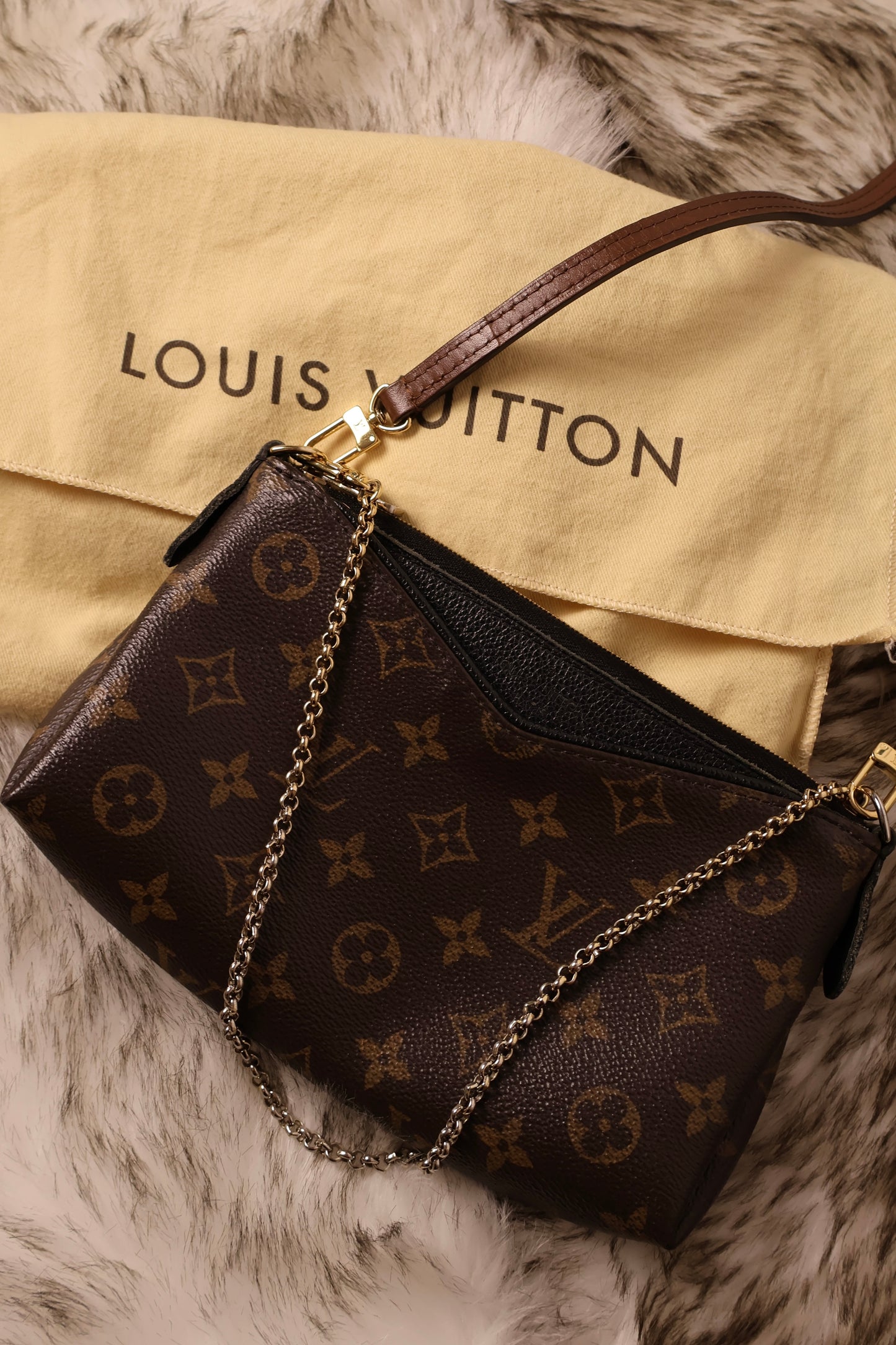 Louis Vuitton Pallas Clutch Bag